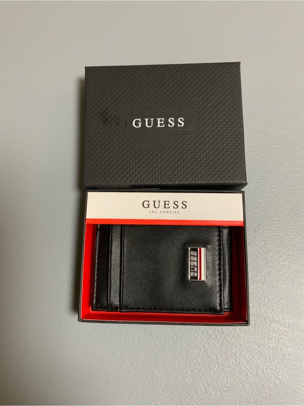 GUESS Black Leather Men's Wallet with Metal Logo Plaque